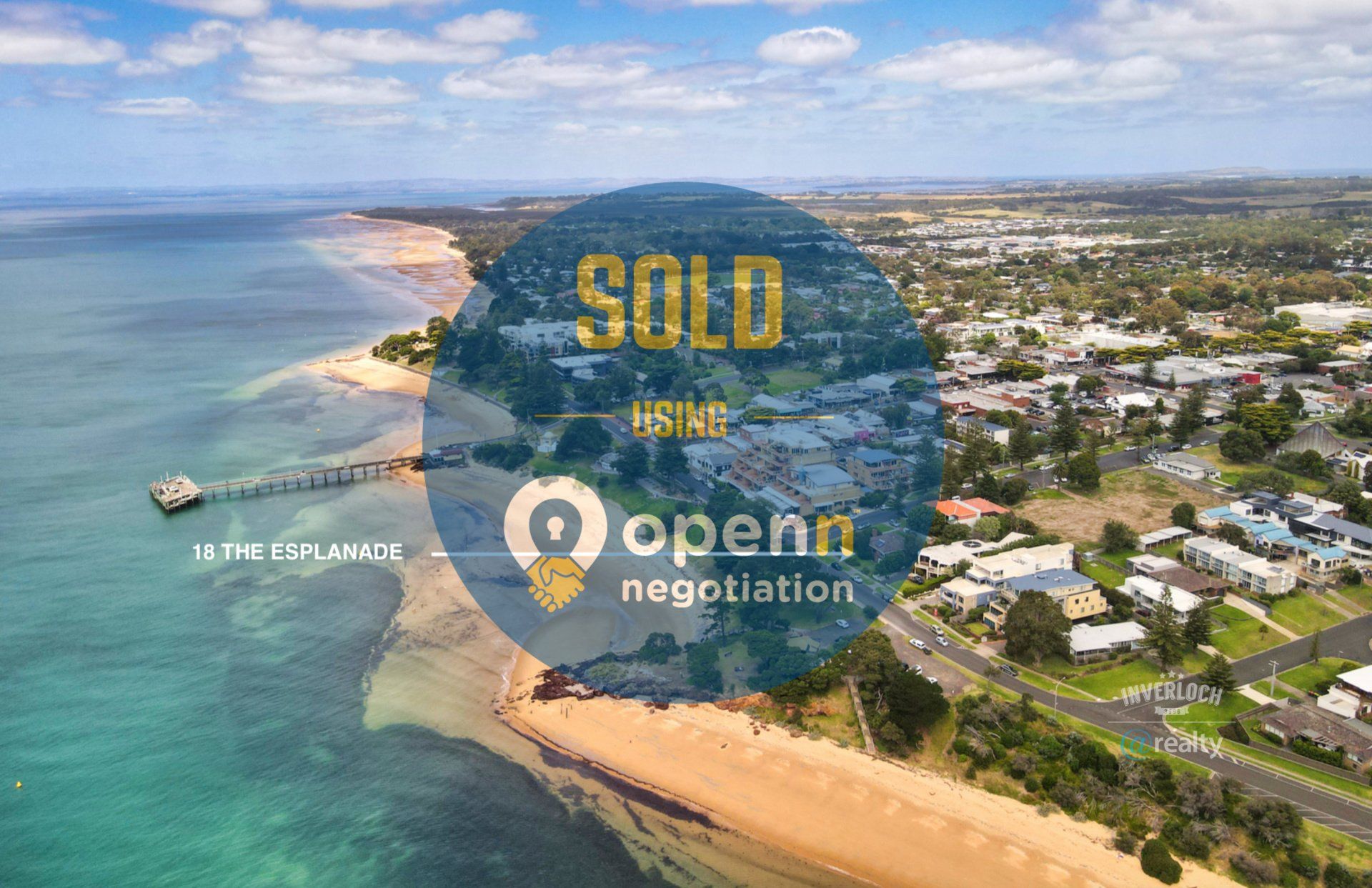 An aerial view of a beach with the words `` sold '' written on it.