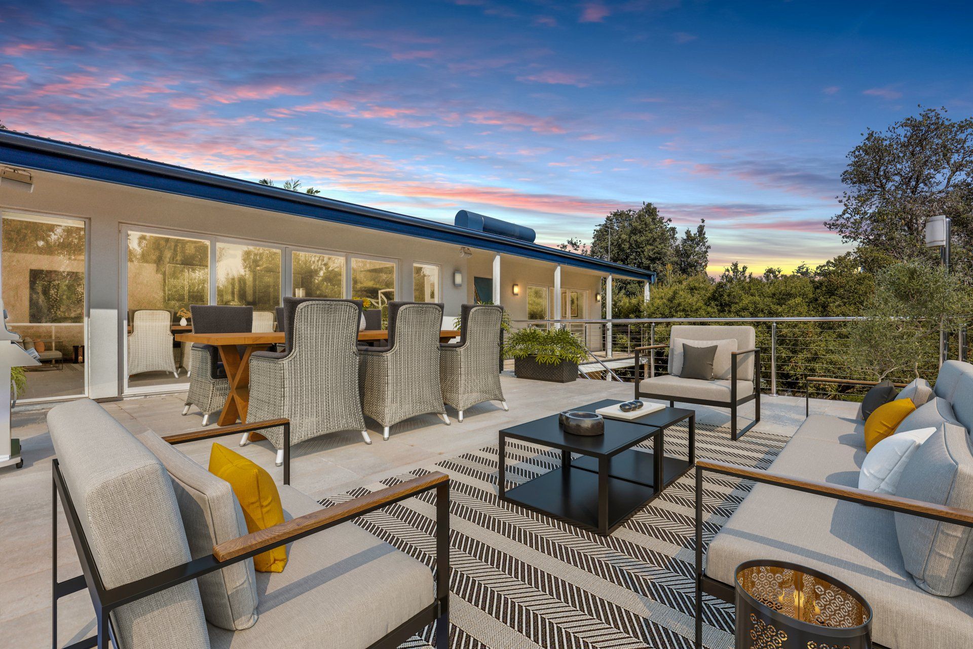 An artist 's impression of a patio with furniture and a table.