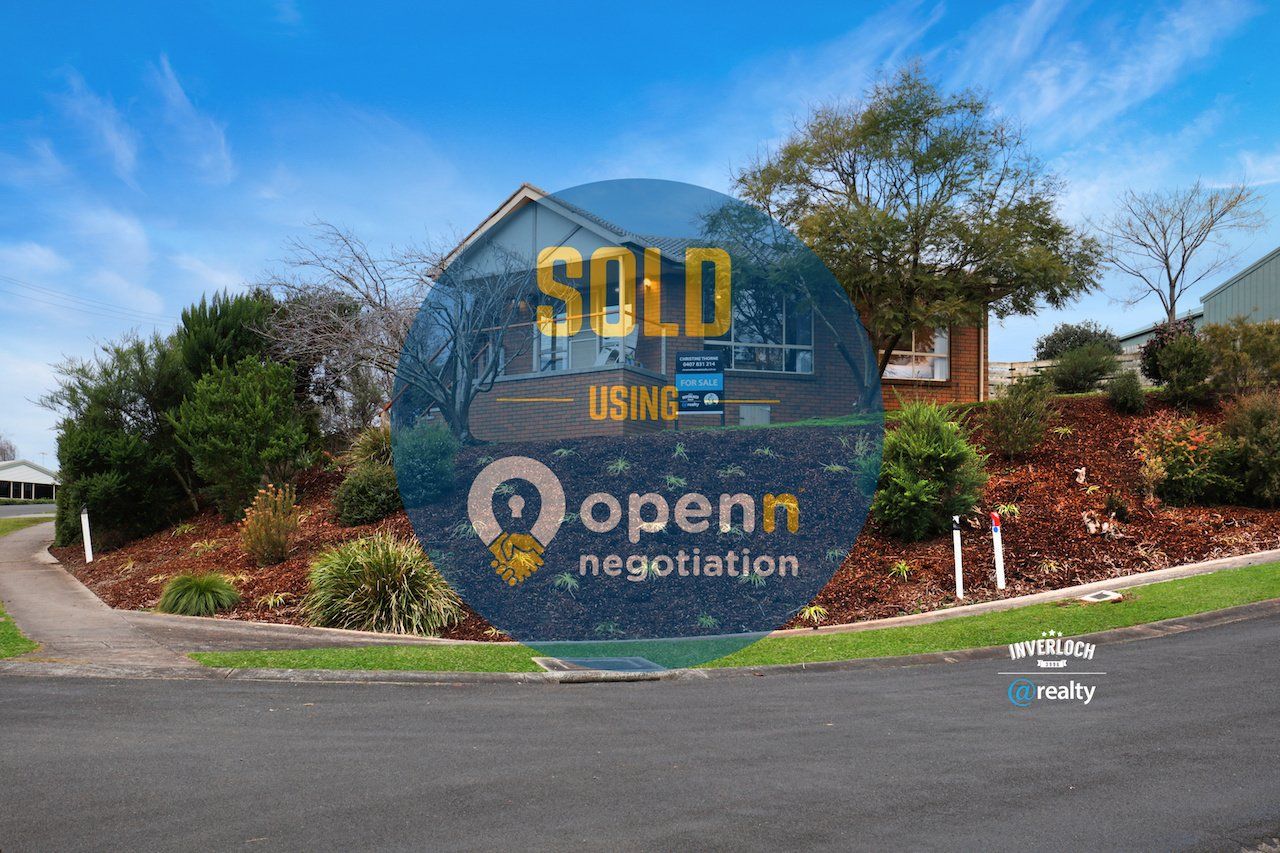 A picture of a house that has been sold by openn negotiation.