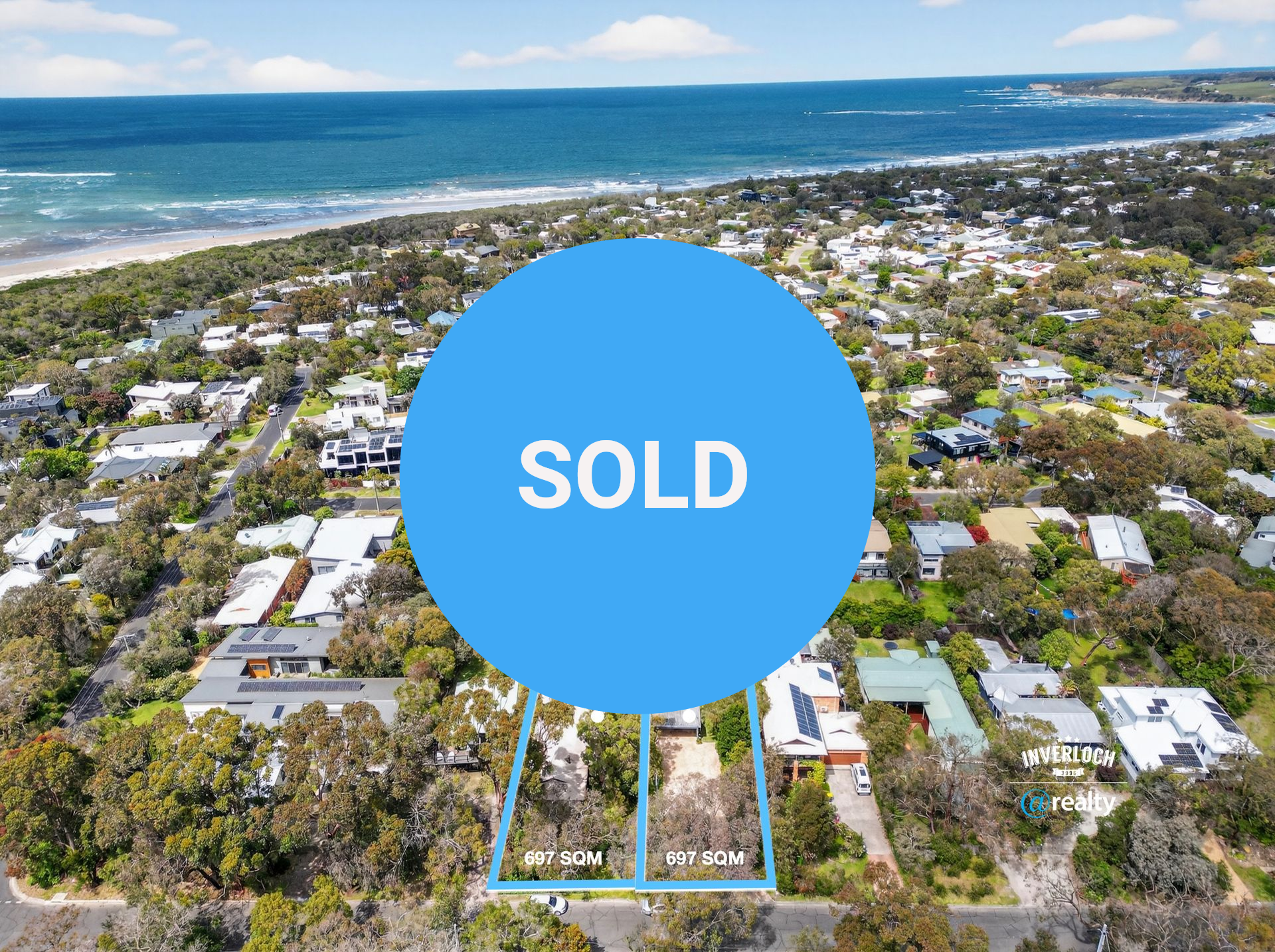 Aerial view of houses and trees near a beach in Cape Paterson, Australia.
