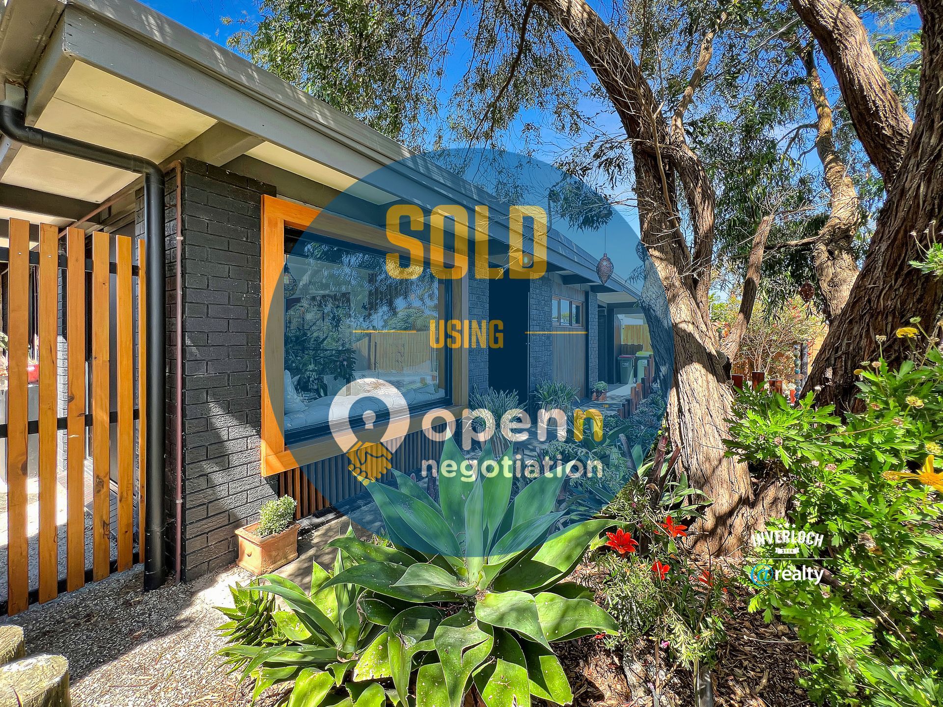 A picture of a house that has been sold using openn negotiation.