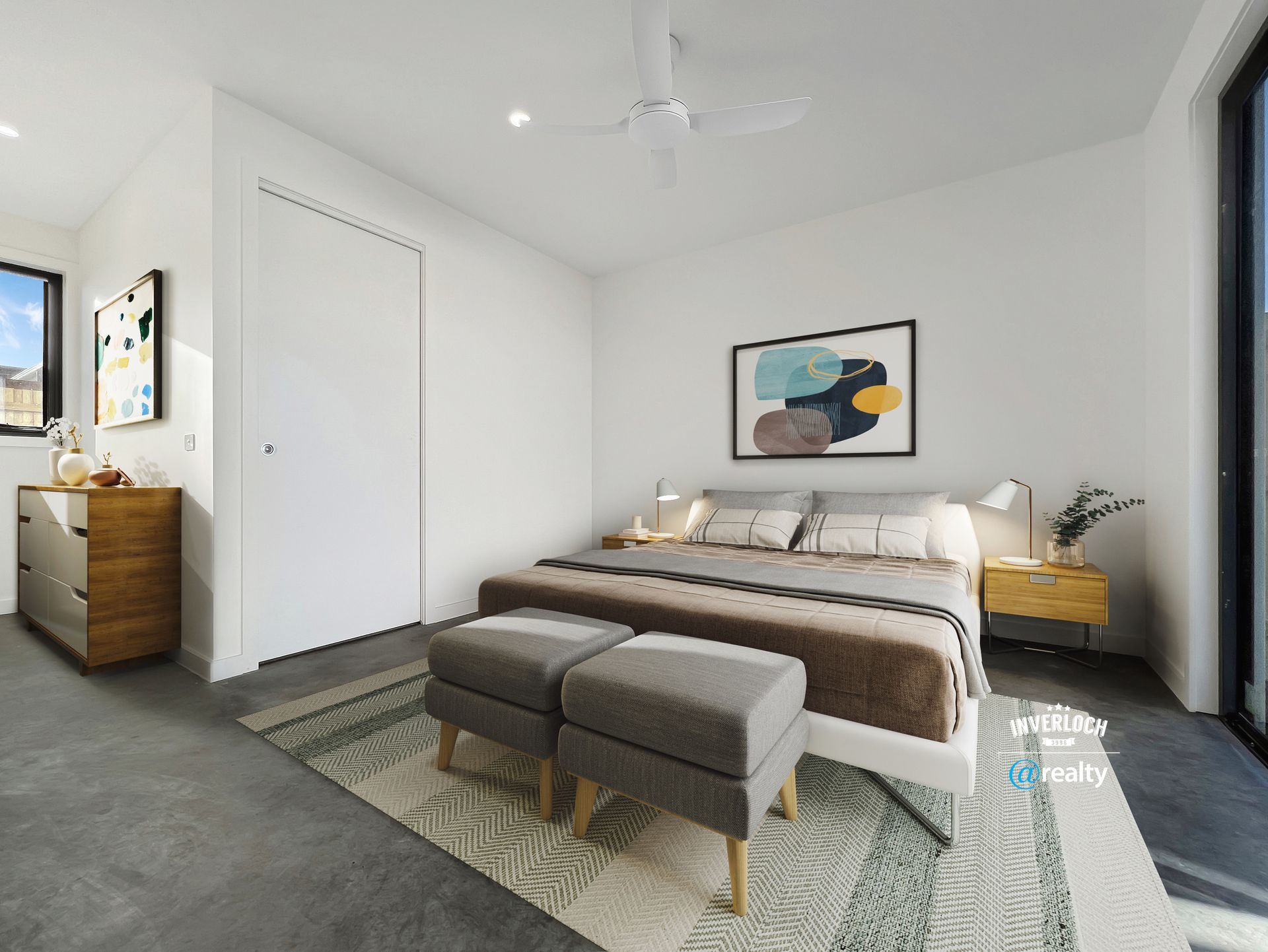A bedroom with a large bed and a ceiling fan.