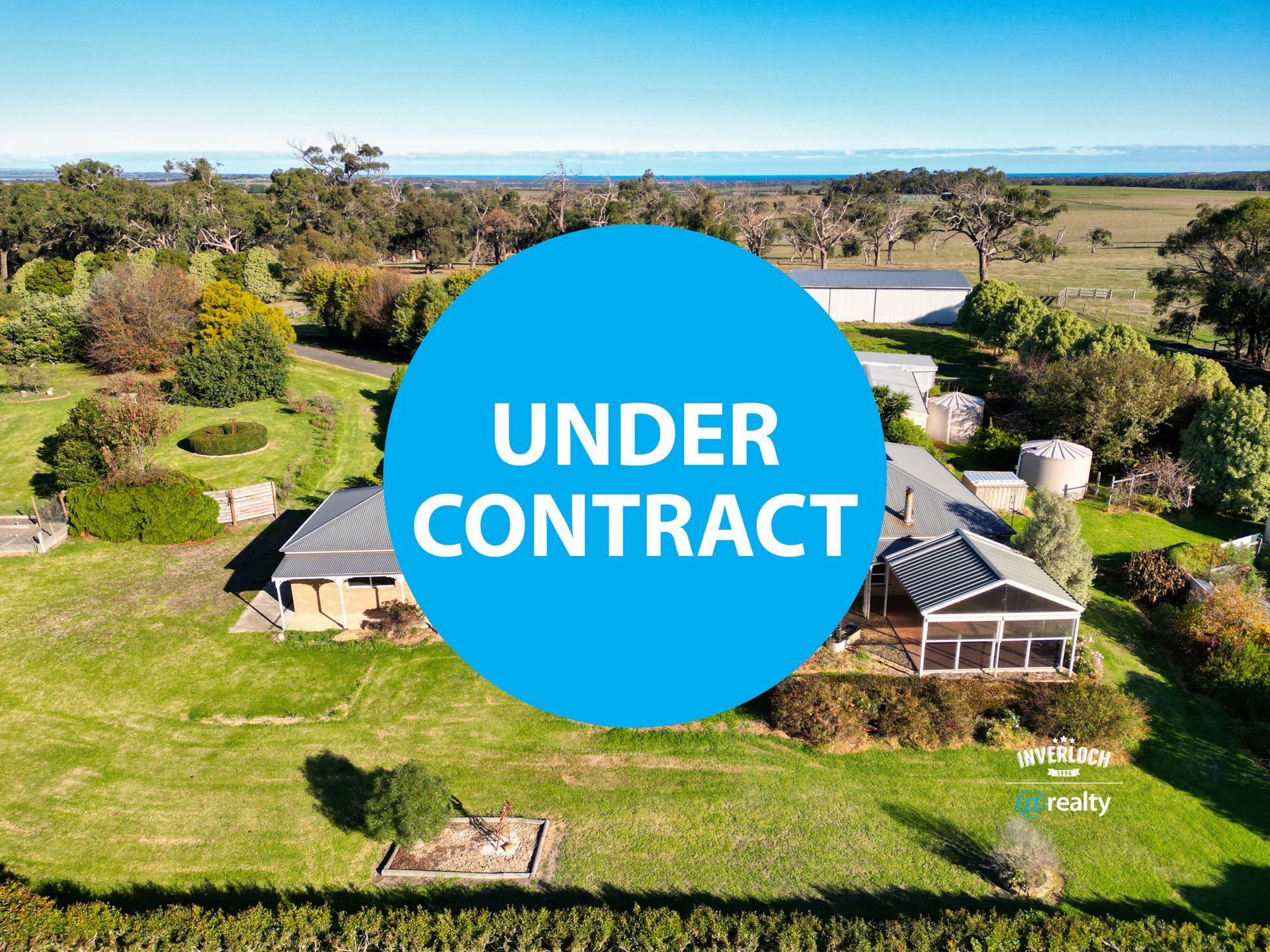 An aerial view of a house that is under contract.