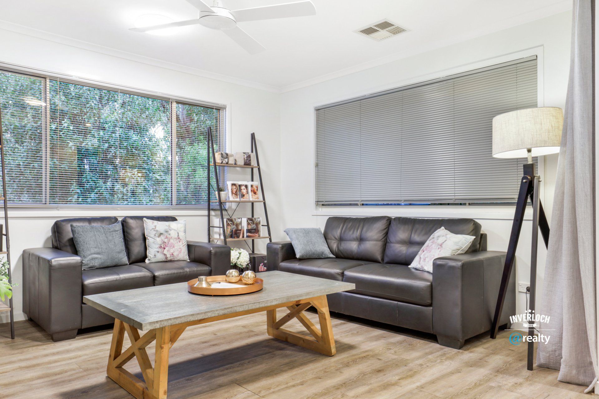 A living room with two couches and a coffee table.