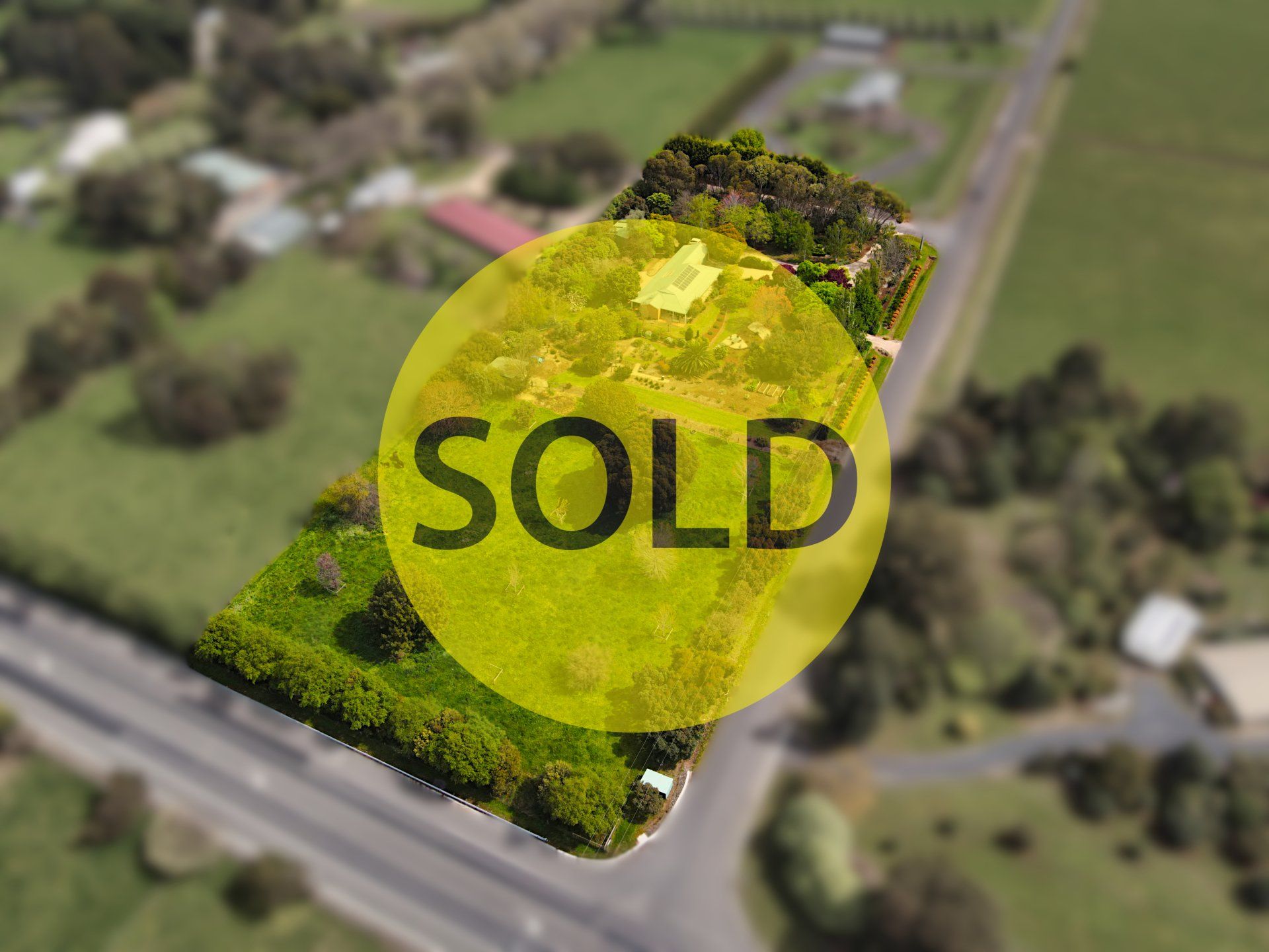 An aerial view of a property that has been sold