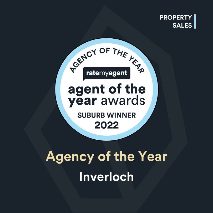 A badge that says agency of the year on it