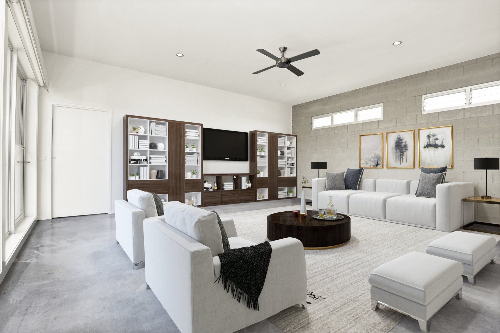 A living room with white furniture and a ceiling fan.