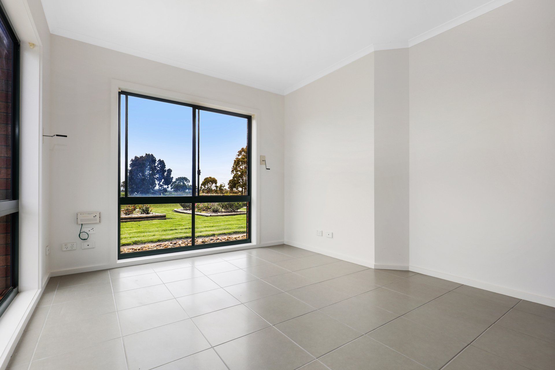 There is a large window in the middle of the room.