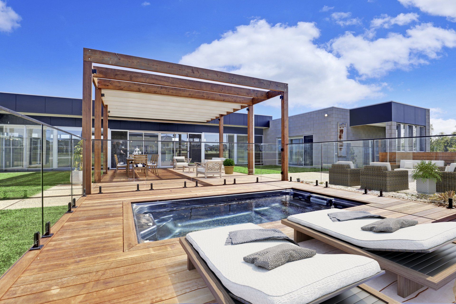 An artist 's impression of a house with a swimming pool and a pergola.