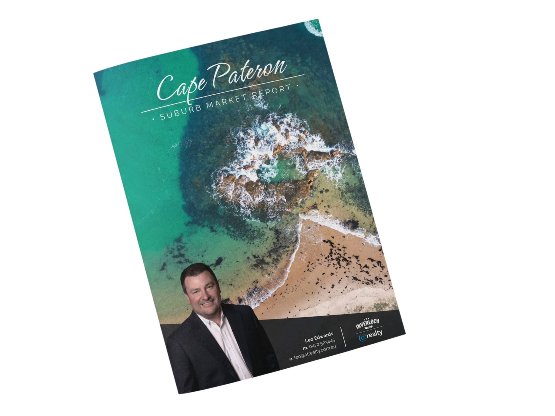 Brochure cover: Cape Paterson coast with man in suit, white text on turquoise, black box.