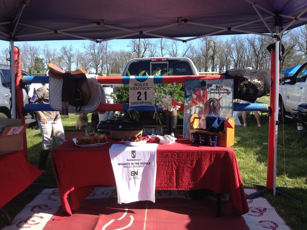 A table under a tent with the number 21 on it