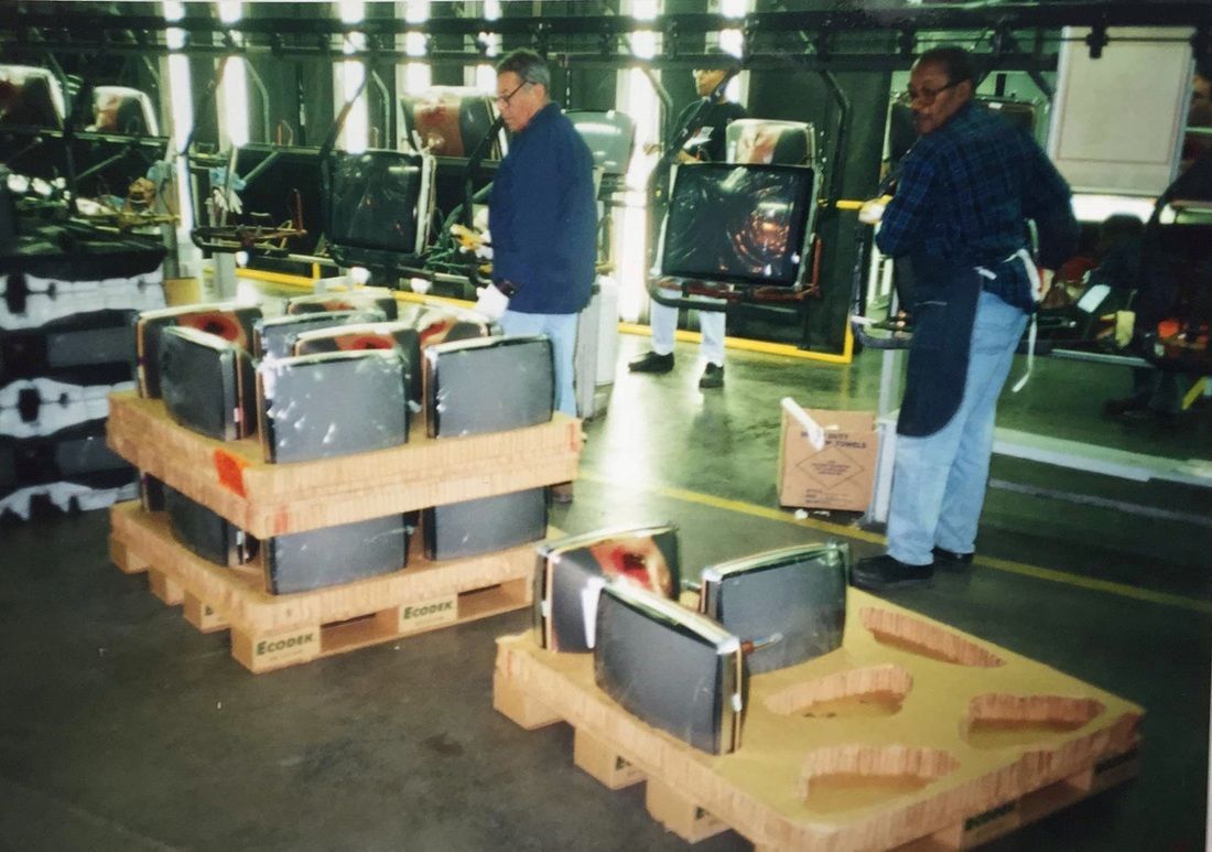 Televisions packaged for shipping on a custom corrugated pallet.