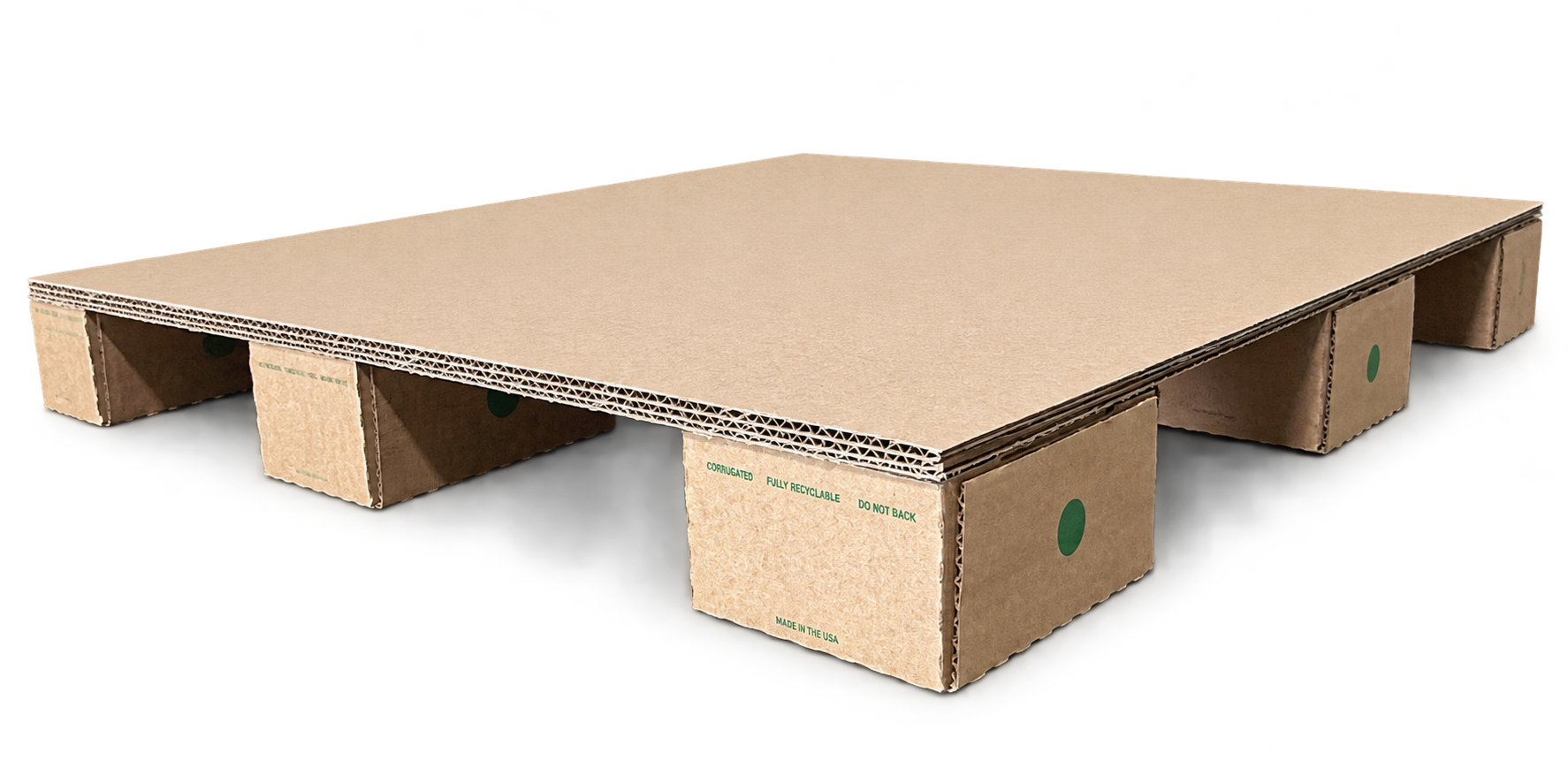 Corrugated cardboard shipping pallet resting on a warehouse floor.