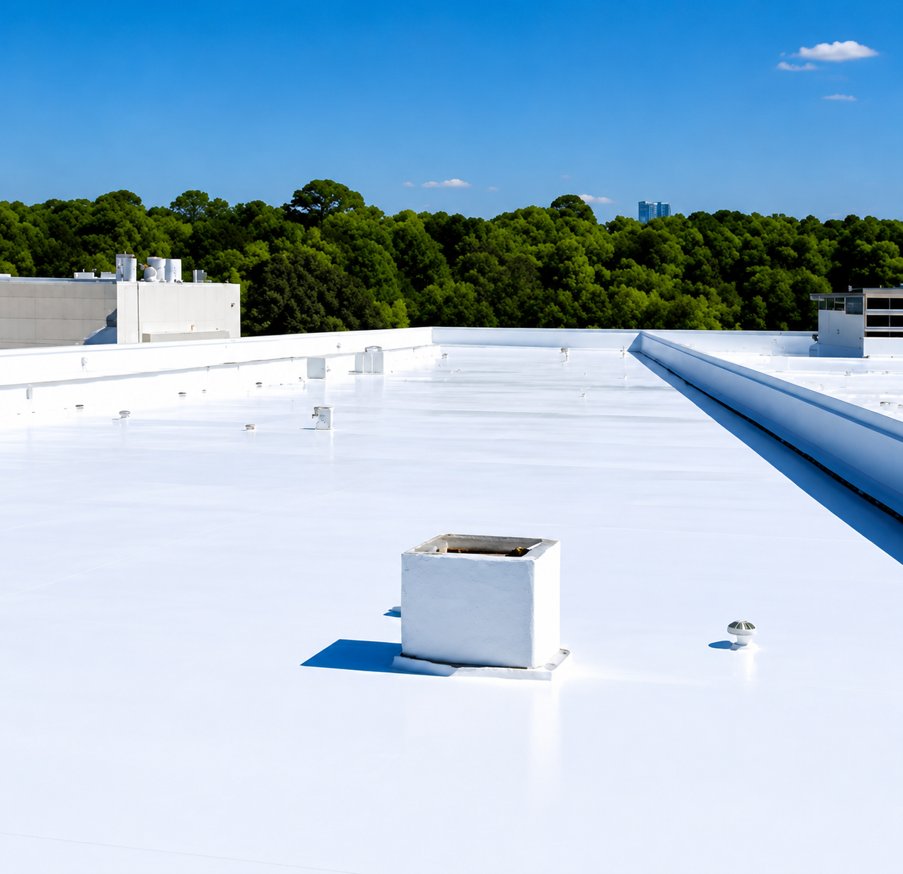 Worker installing dark roof tiles on a house under construction