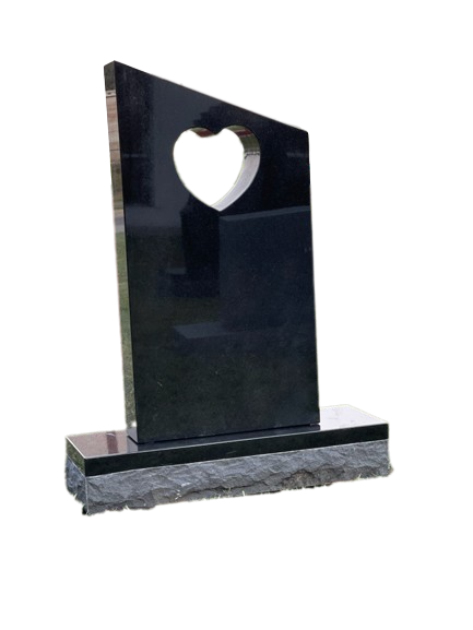 Black granite headstone with a heart-shaped cutout, set on a gray stone base.