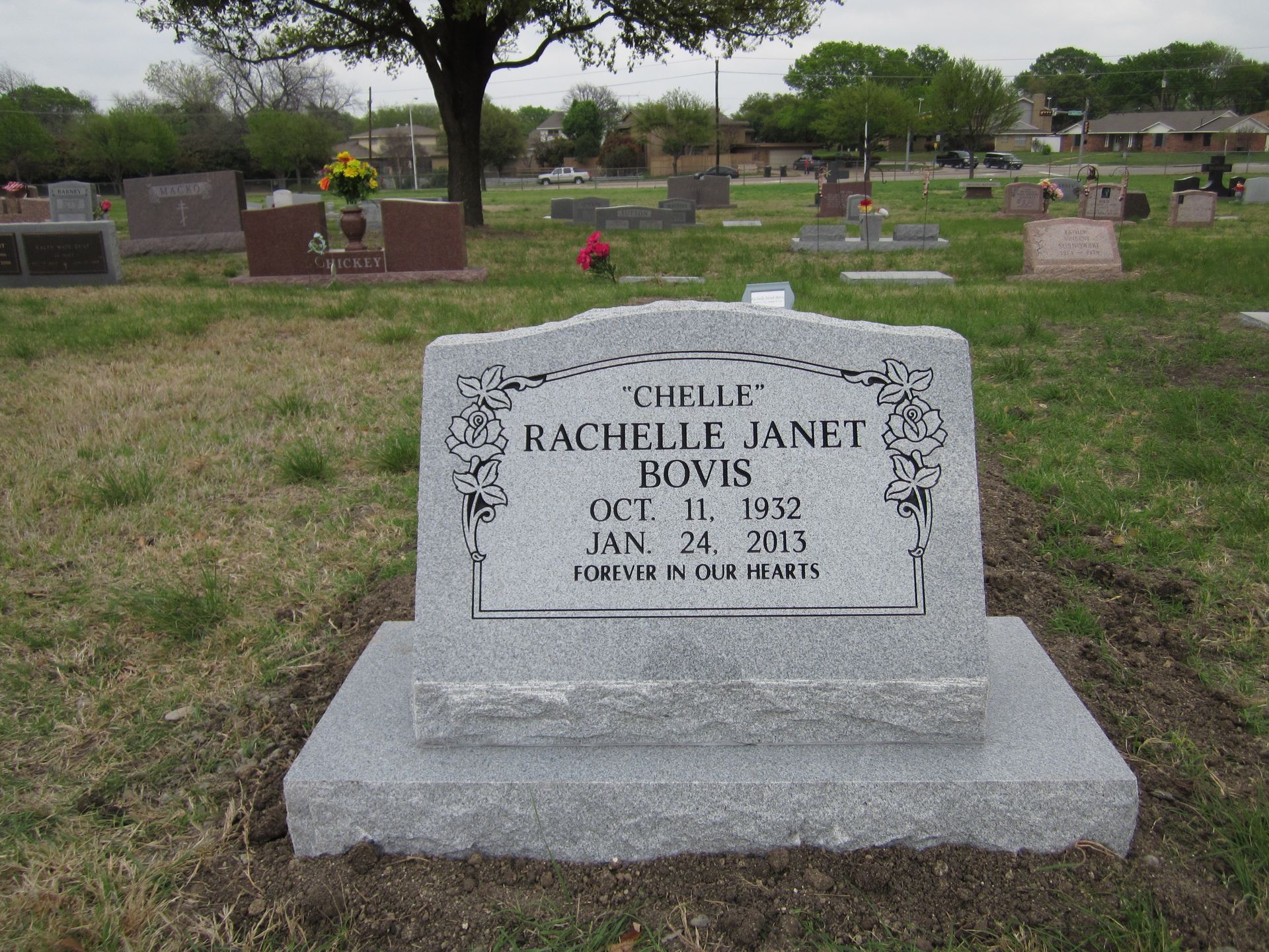Gravestone of Chelle Rachelle Janet Bovis with dates of birth and death, in a cemetery.