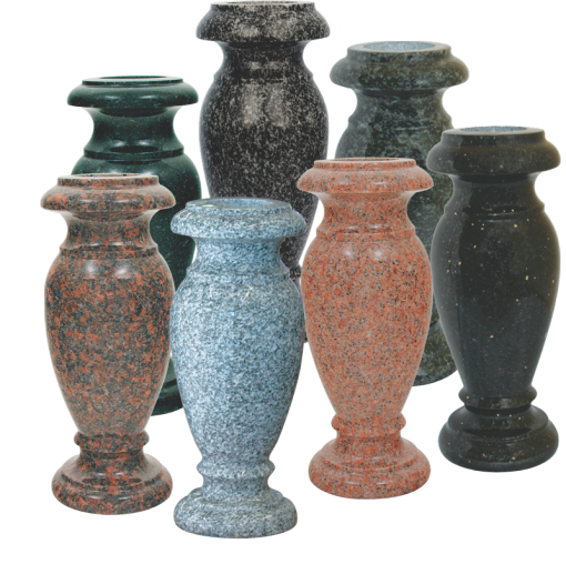 Seven granite vases, different colors, displayed together.