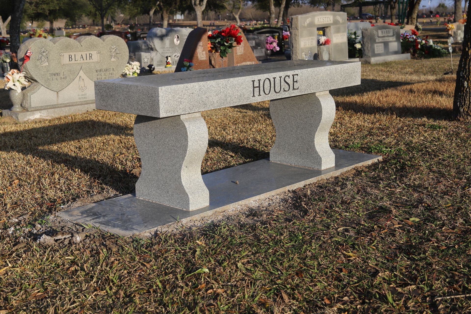Granite bench in a cemetery with 