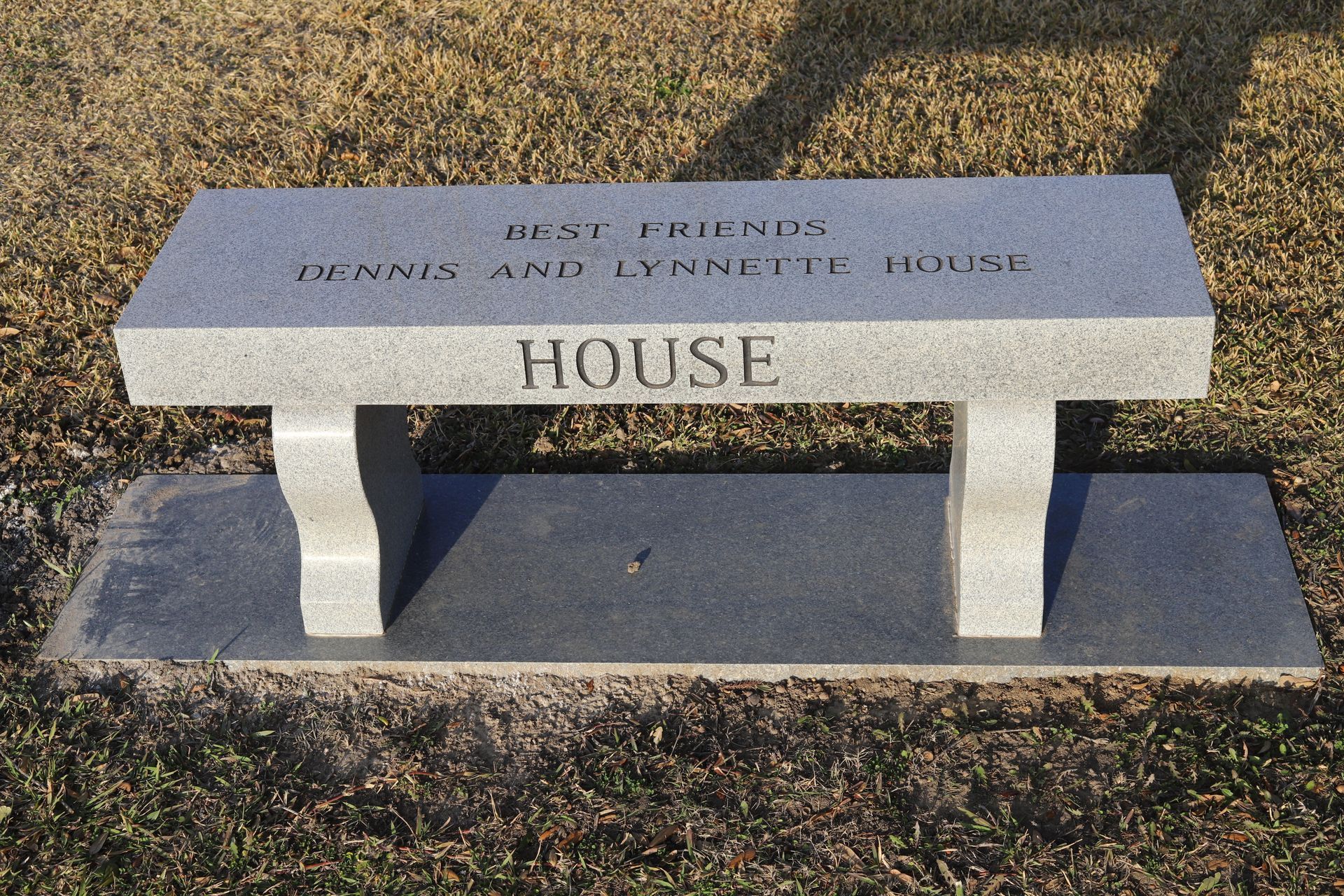 Stone bench with the inscription 