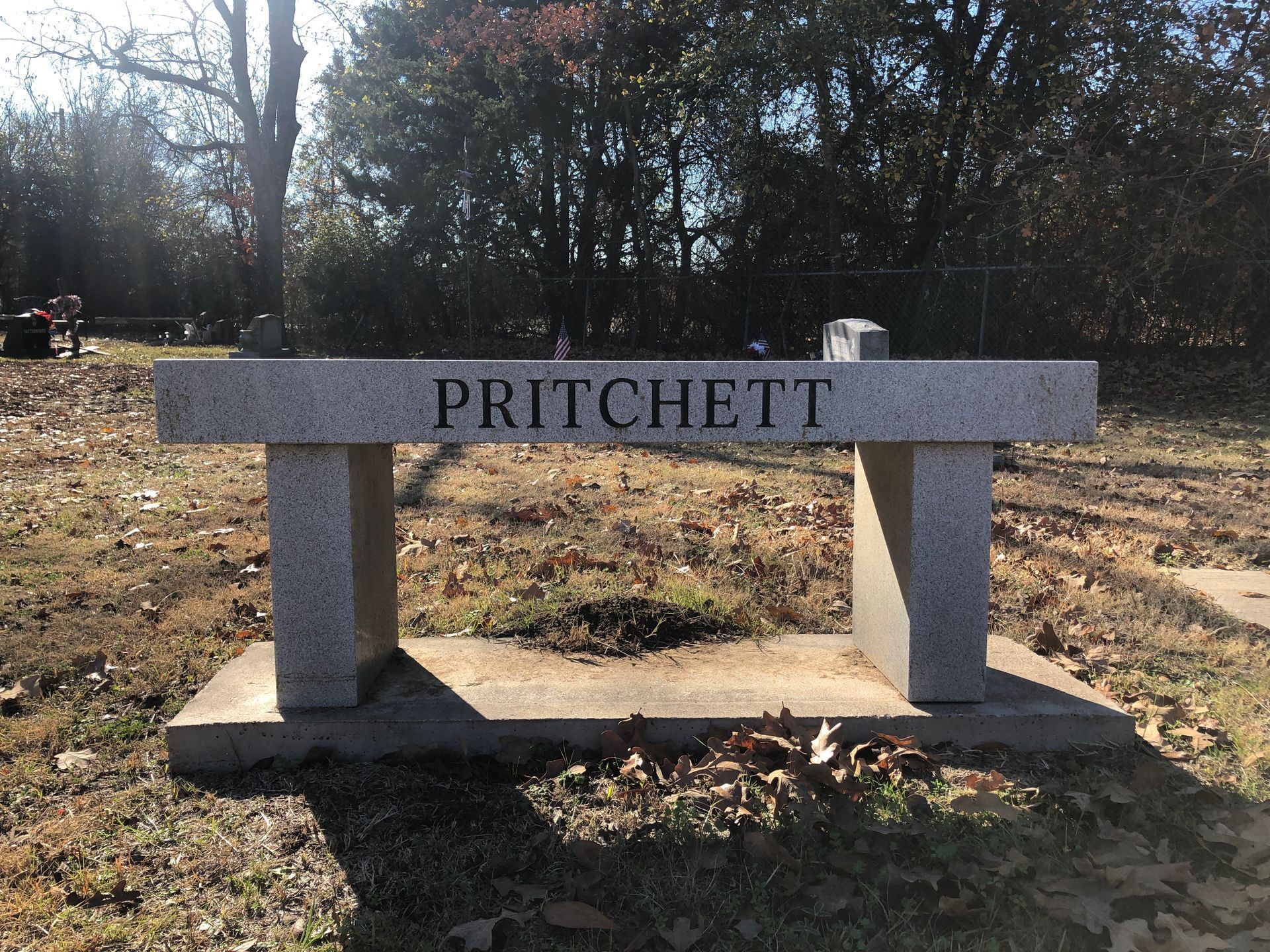 Granite bench with the name 
