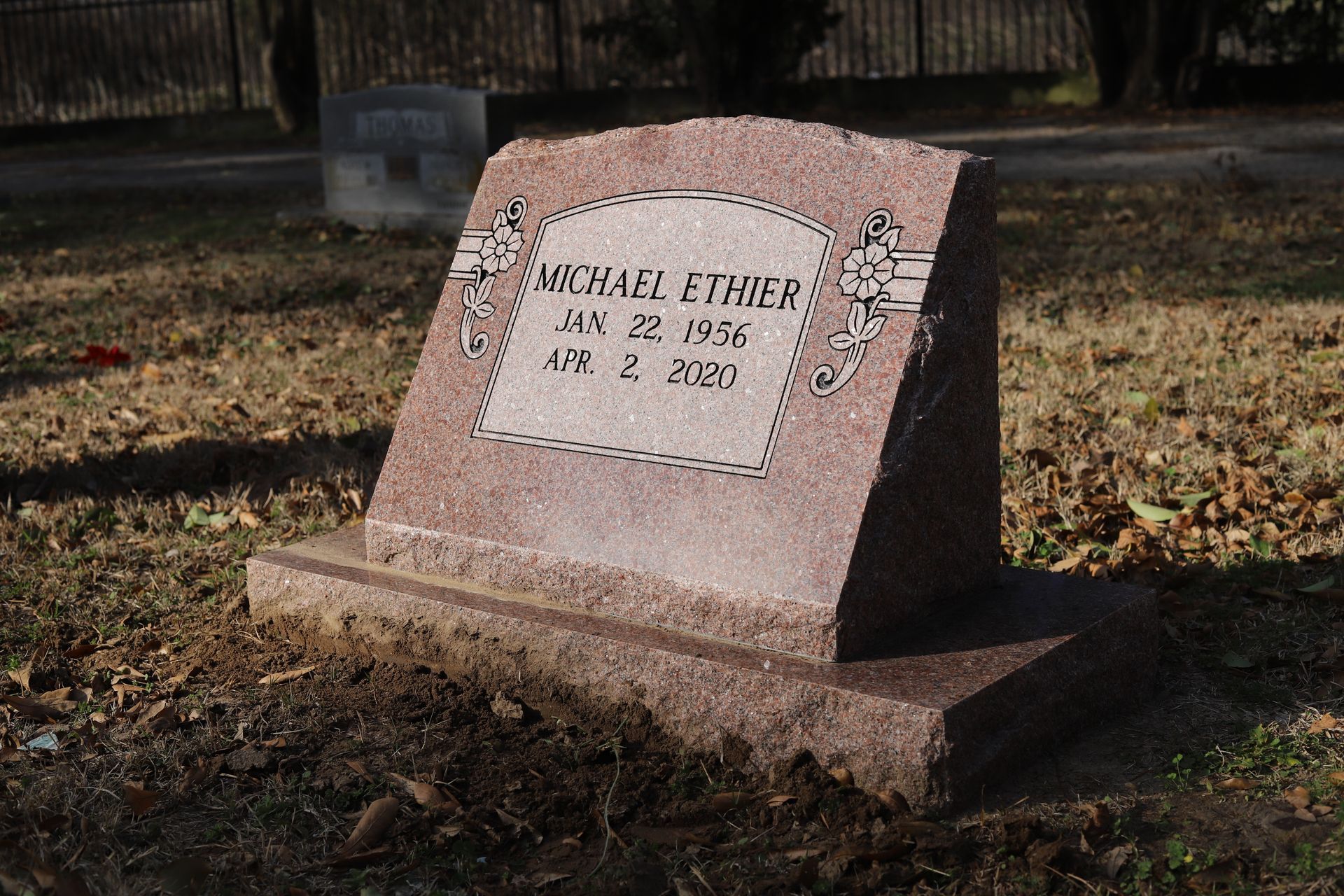 Pink granite headstone with