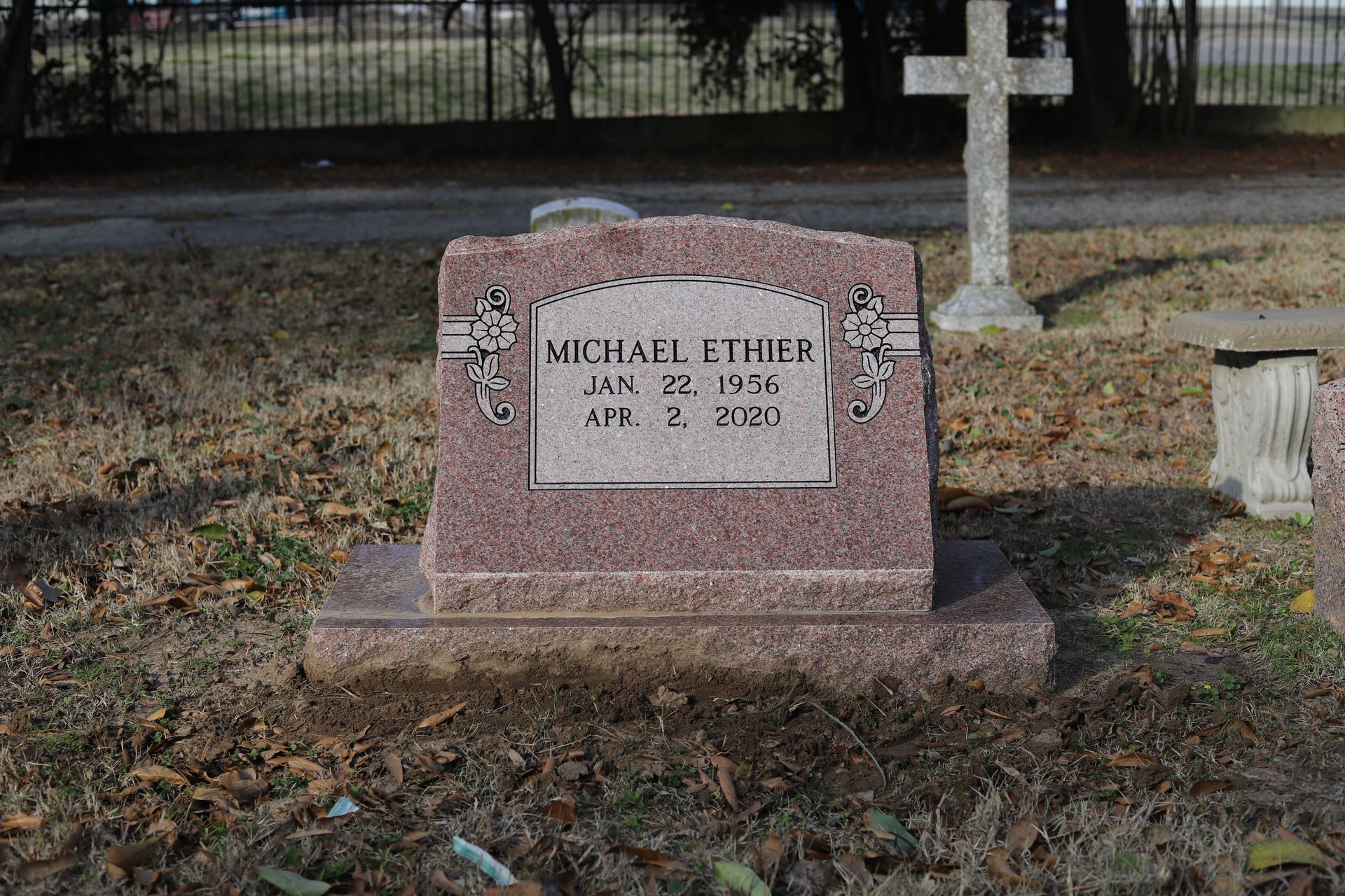Headstone in a cemetery; name