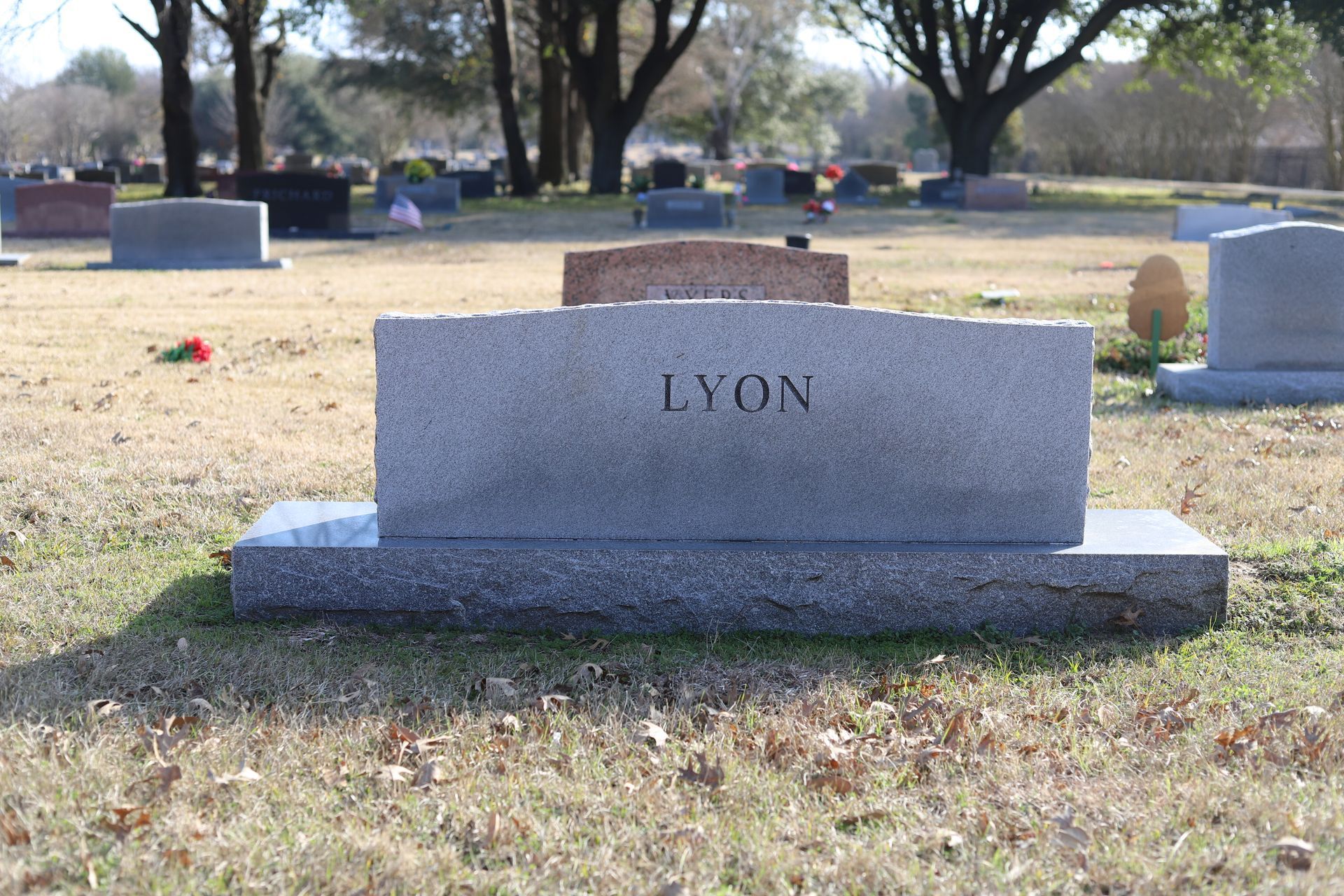 A gray granite headstone with