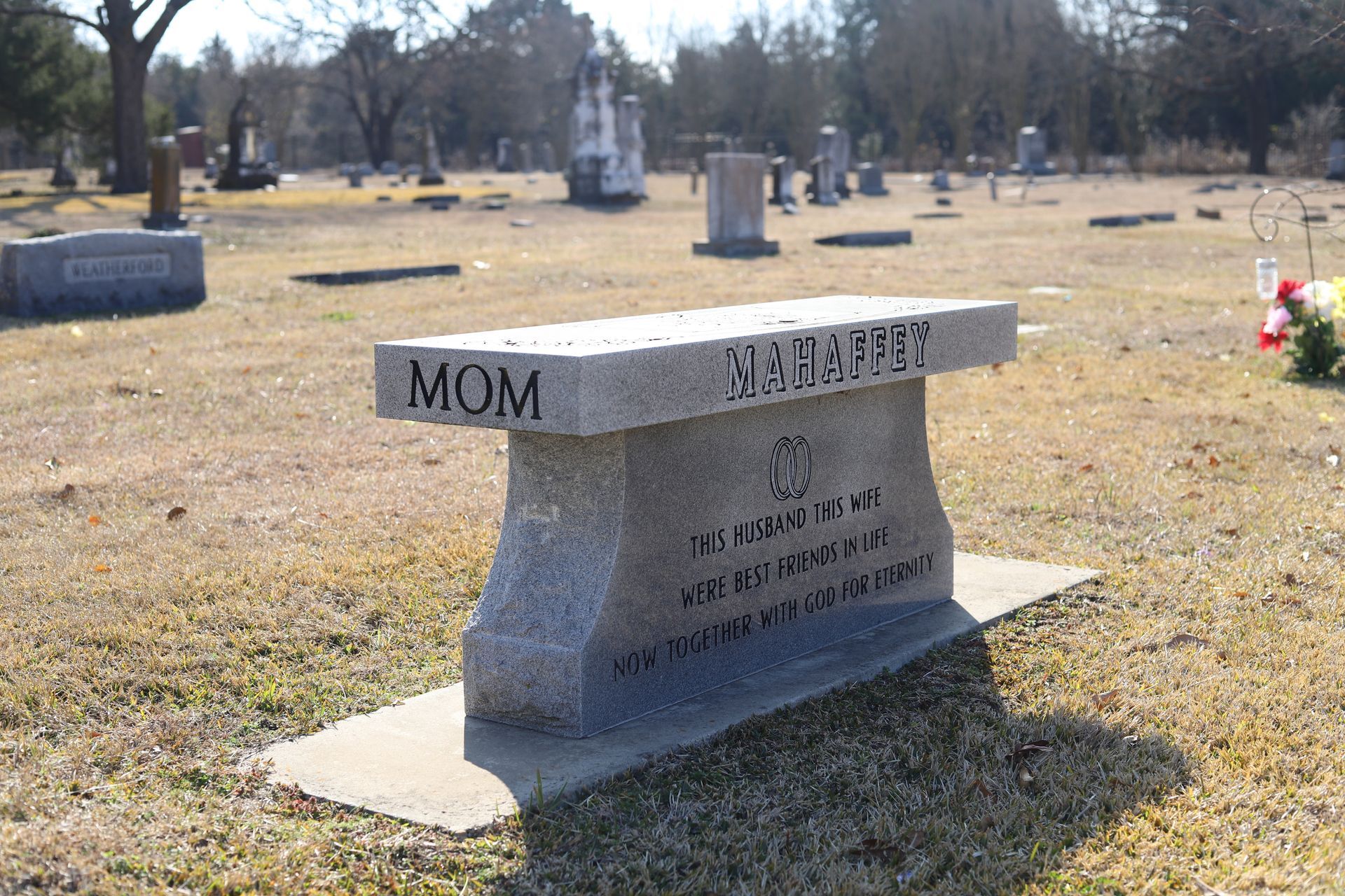 A stone bench engraved with 