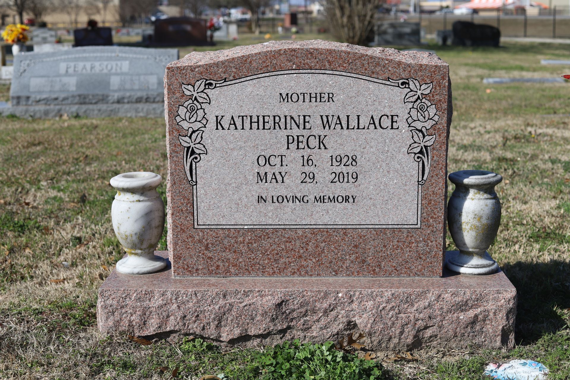Headstone of Katherine Wallace Peck, with dates 1926-2019, in a cemetery.