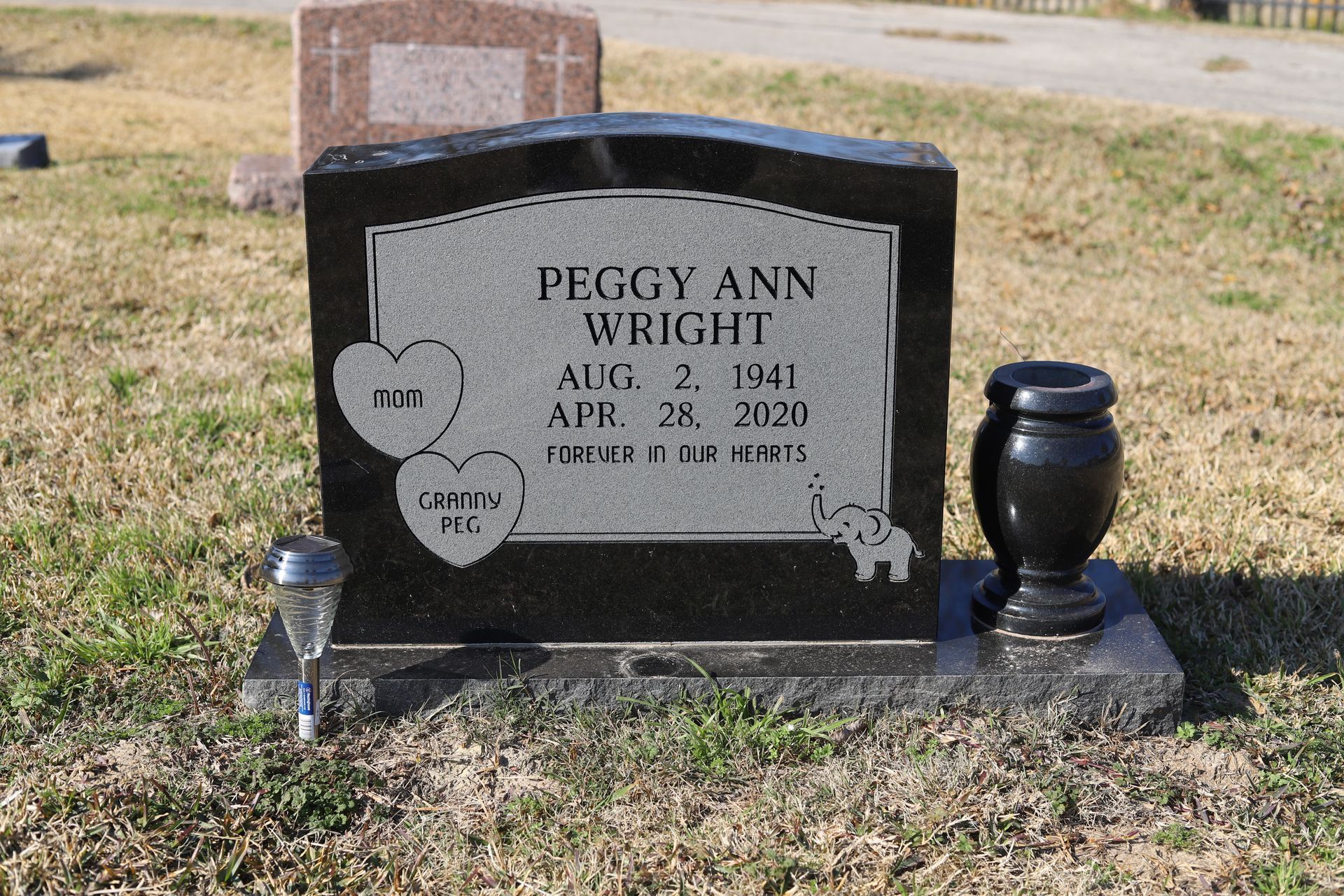 Black granite headstone with