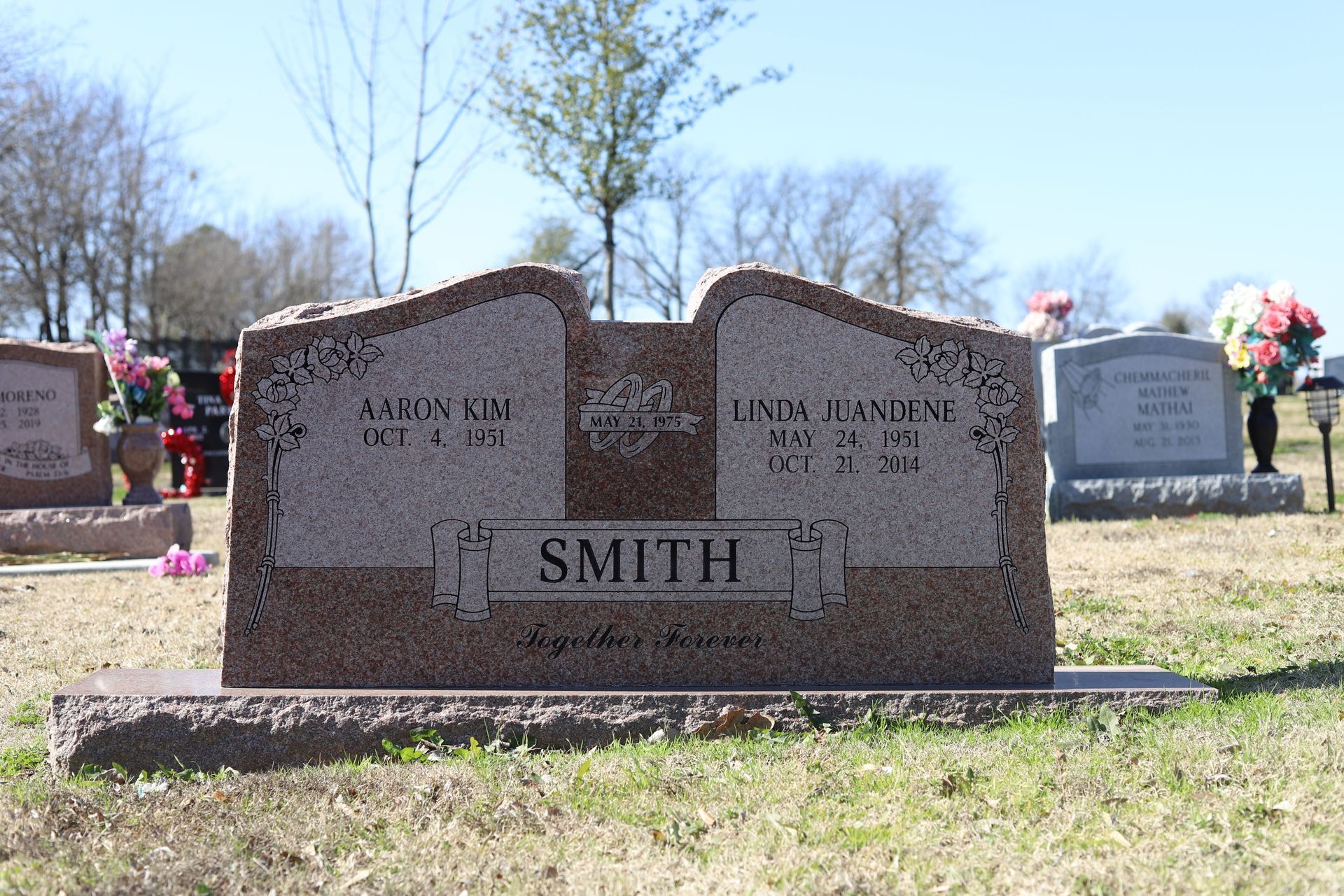 Headstone in a cemetery; reads Aaron King Oct 6, 1925; Linda Landers Nov 27, 1924; 