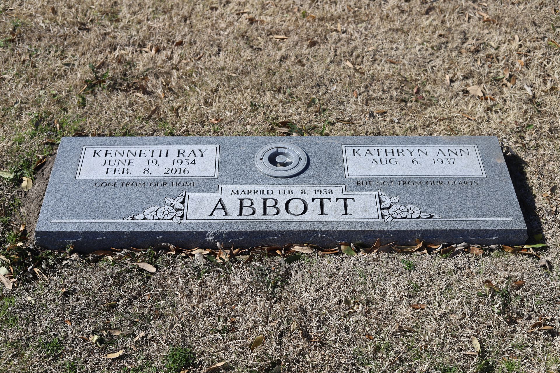 Gray granite headstone with 