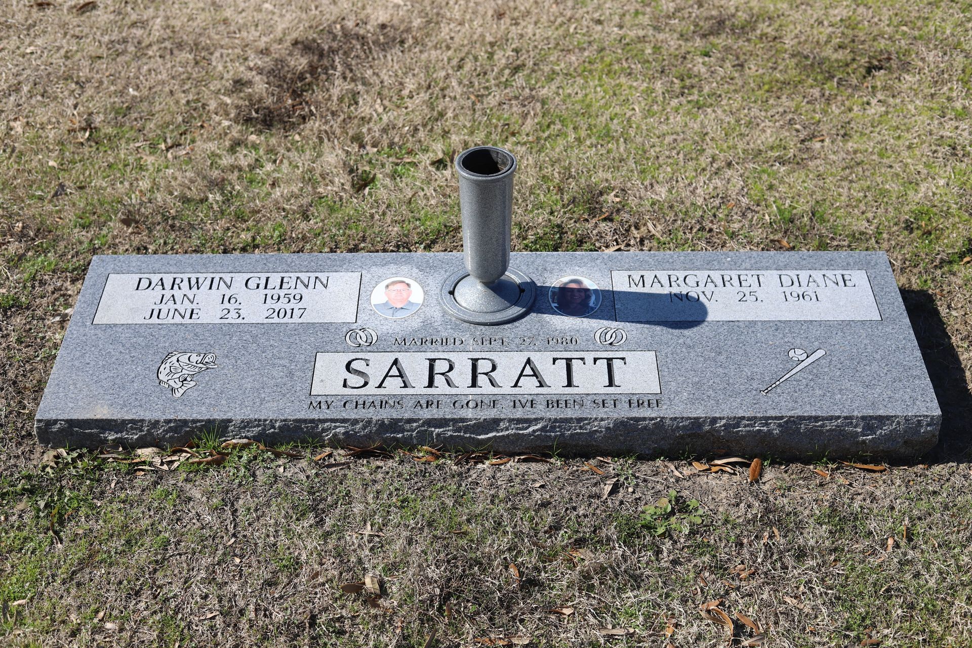 Gray granite headstone with the name 
