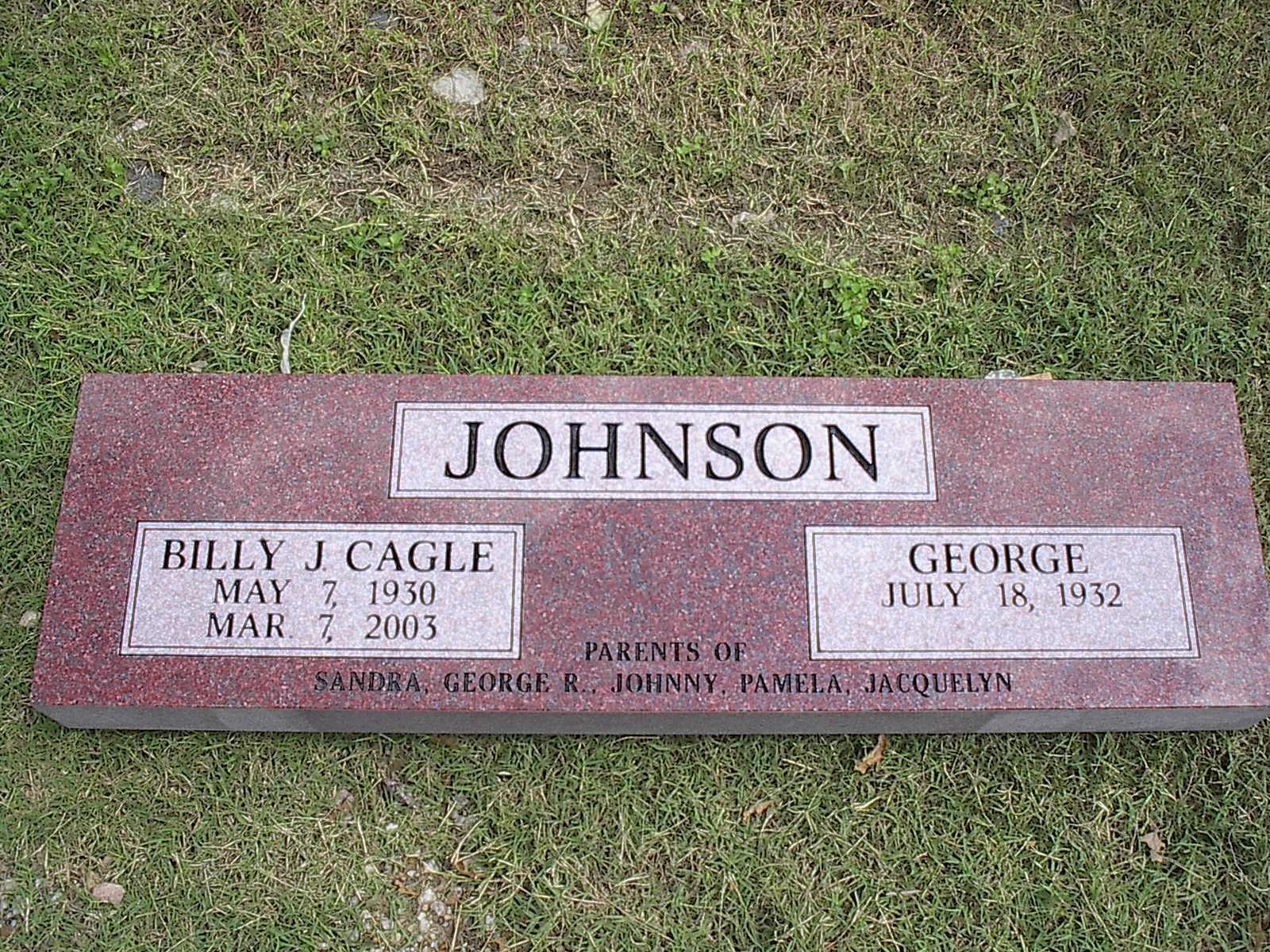 Red granite tombstone with 