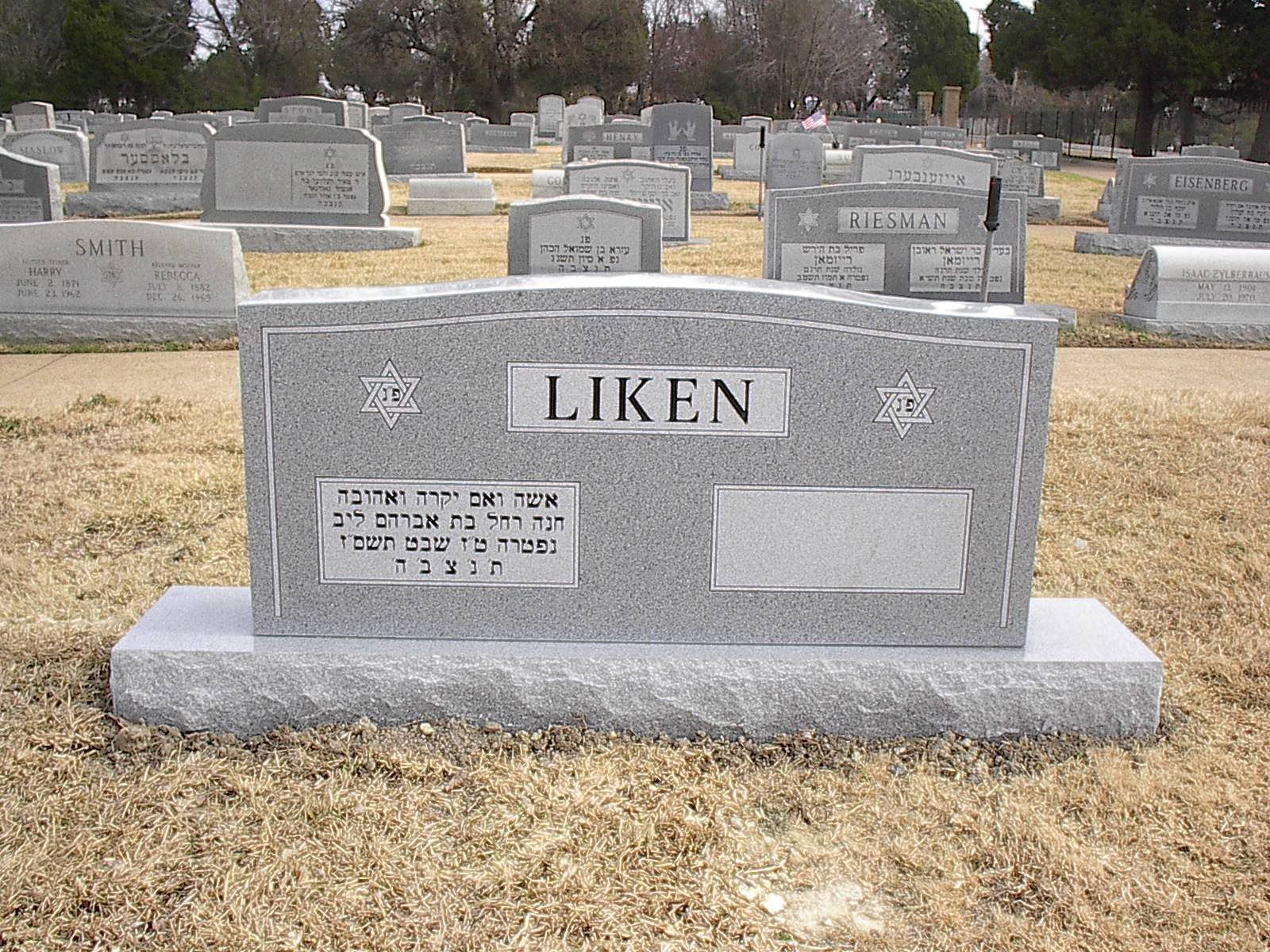 Gray headstone with the name