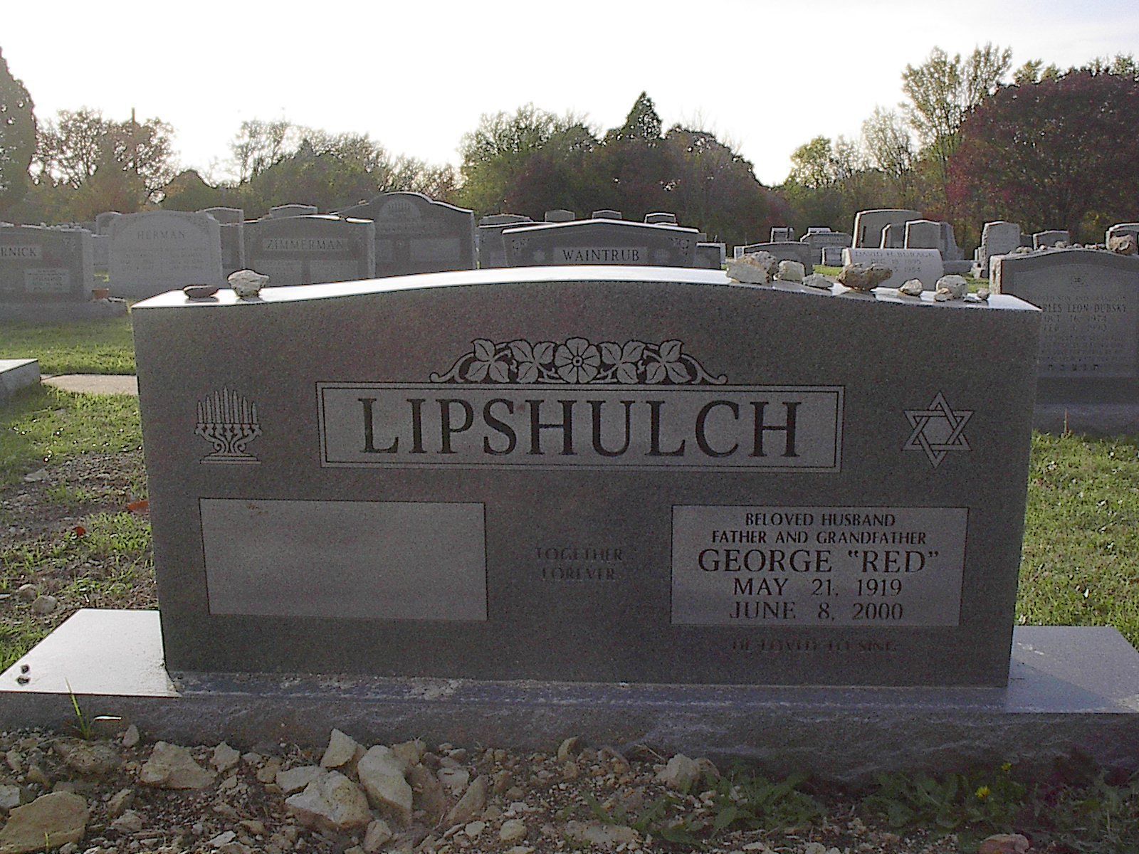 Grave marker in a cemetery with the name