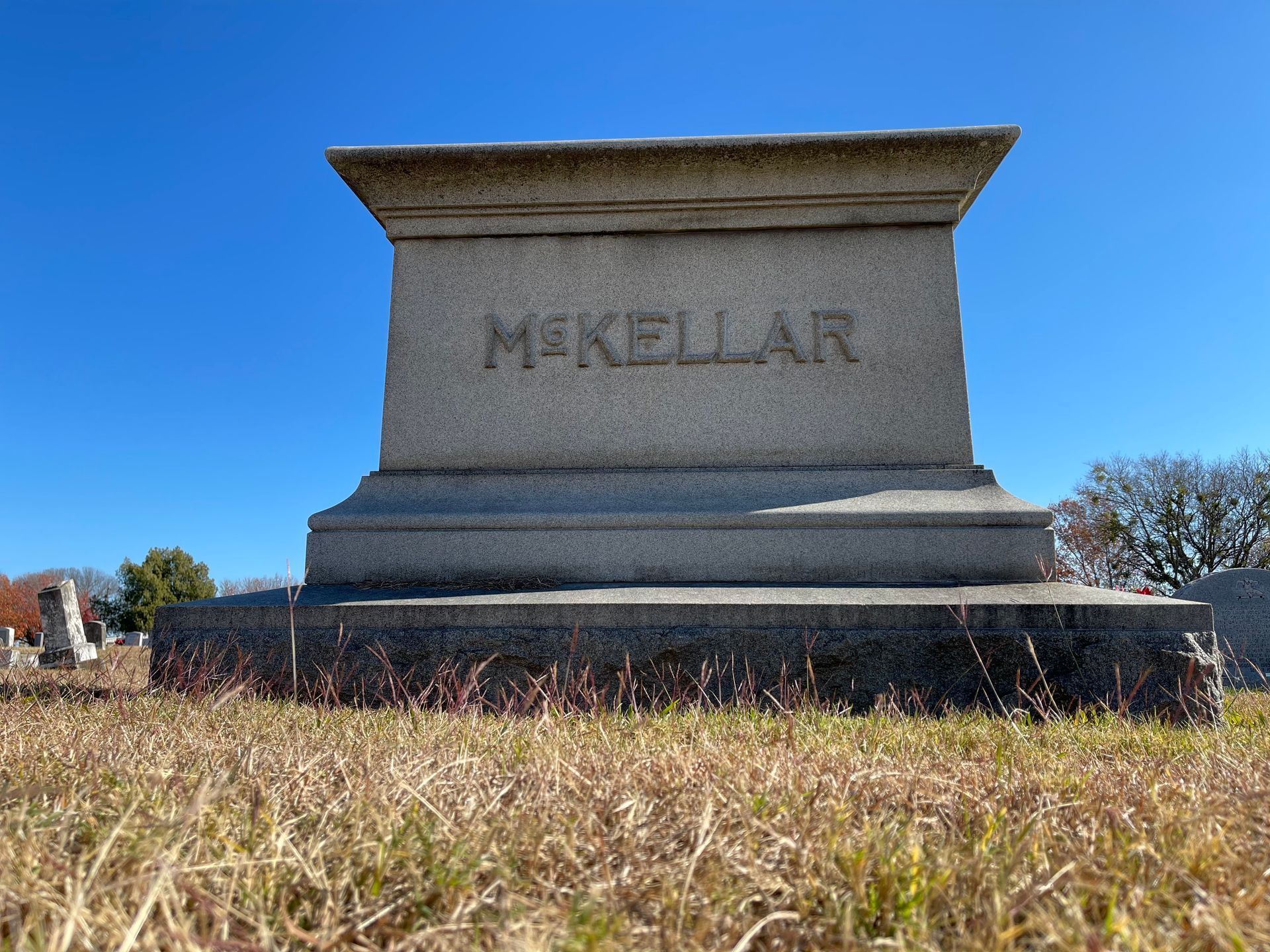Gray stone tombstone with 