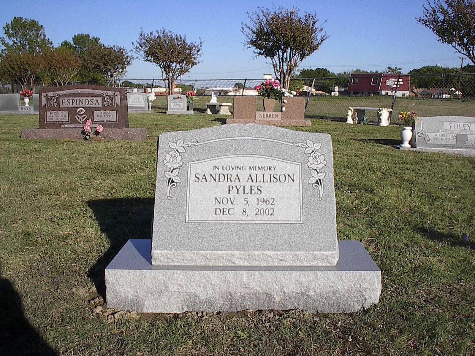Headstone in a cemetery with the name Sandra Allison Fyles and dates Nov 3, 1962 - Dec 8, 2012.
