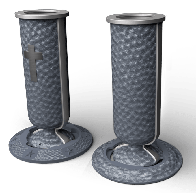Two gray, textured stone flower vases; one with a cross, both with silver trim.