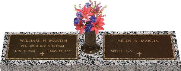 Grave of William H. Martin, who died in Vietnam, and Helen B. Martin, with flowers on a granite base.