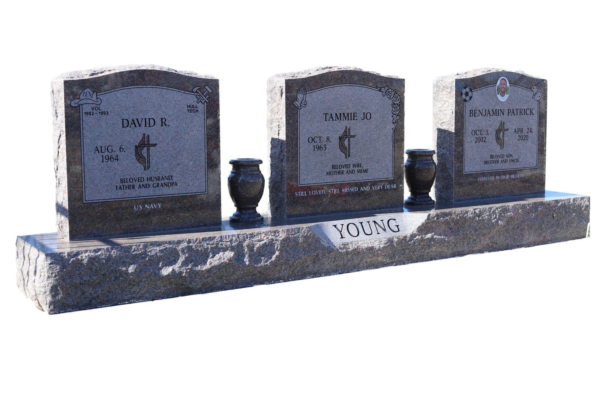 Three granite headstones with urns, marked 