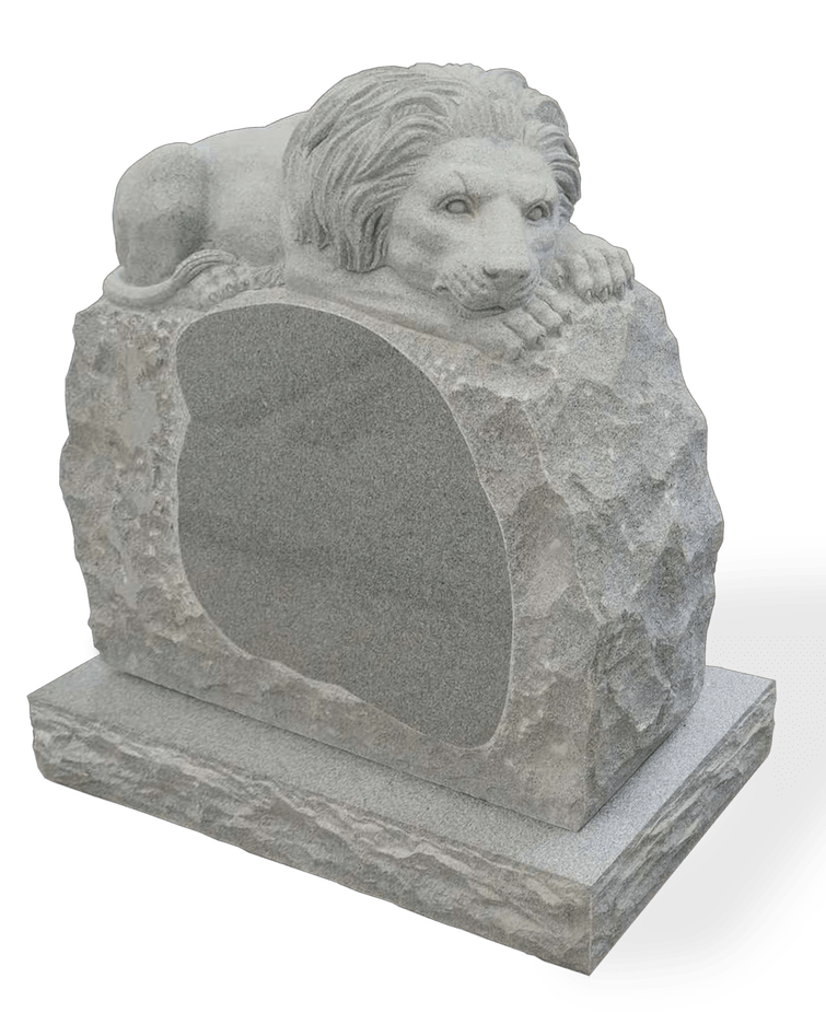 Stone lion sculpture atop a rough-hewn granite monument, with an oval indentation.