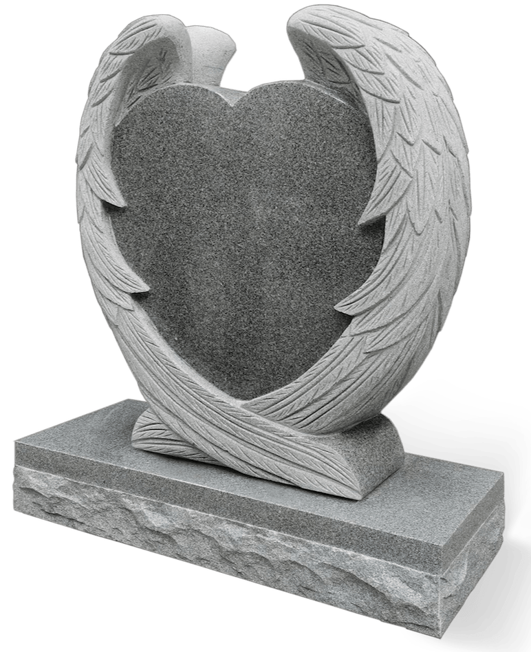 Gravestone shaped as a heart with carved angel wings. Gray stone, set on a rectangular base.