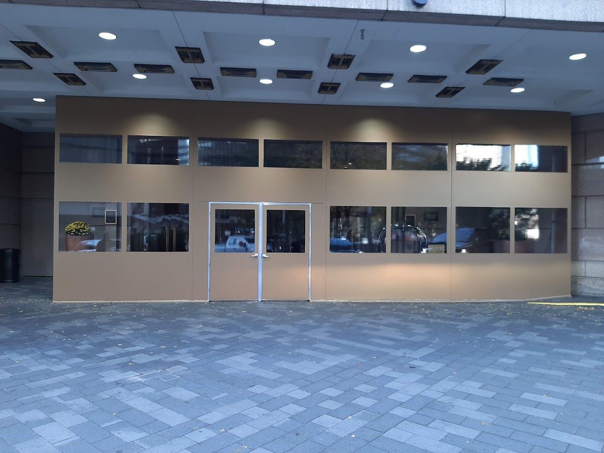 A large building with a lot of windows and doors