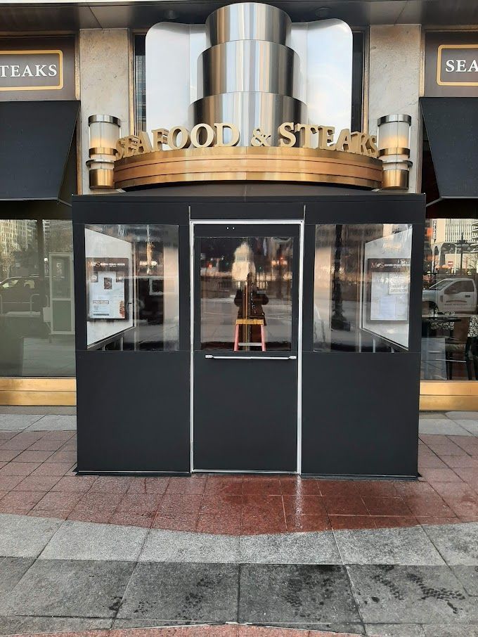 The front of a restaurant called seafood & steaks