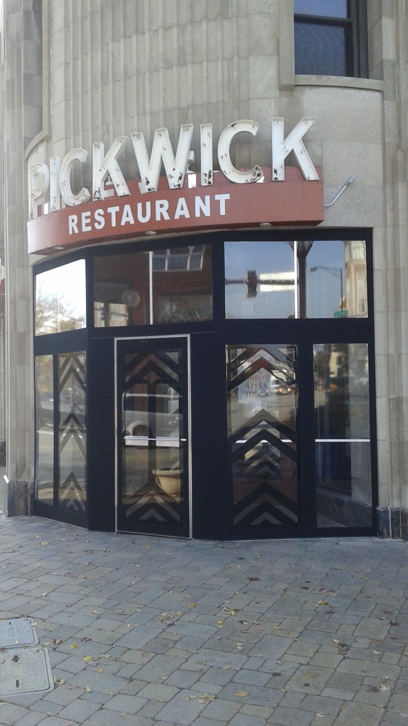 A restaurant with a sign that says pickwick restaurant