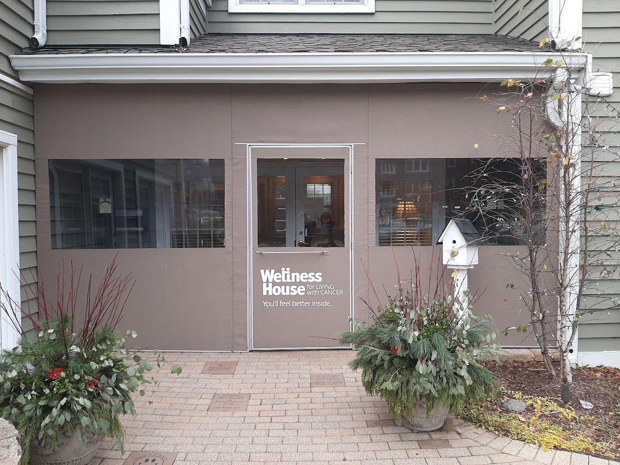 A building with a sign that says ' west mill house ' on it