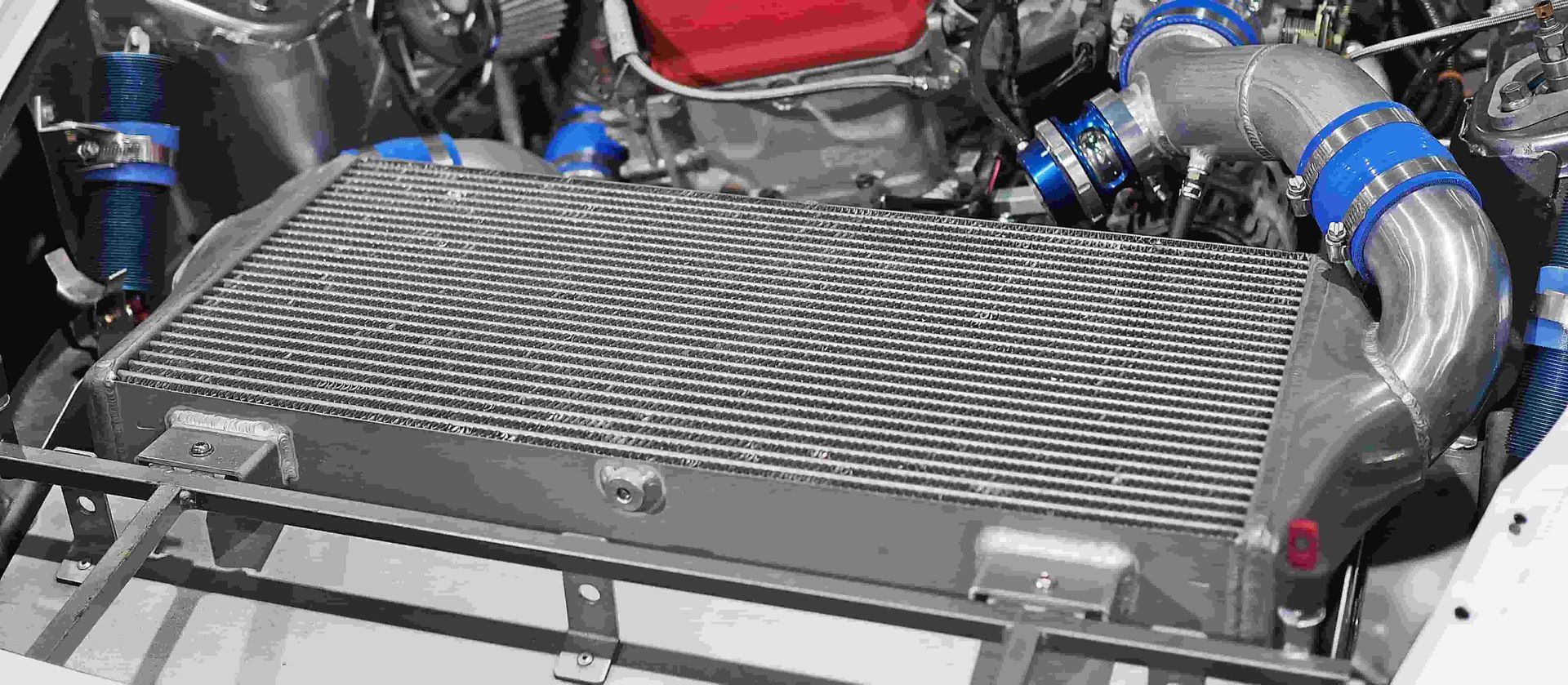 A Close Up of a Car Engine With a Radiator — Bowral Auto Care In Mittagong, NSW