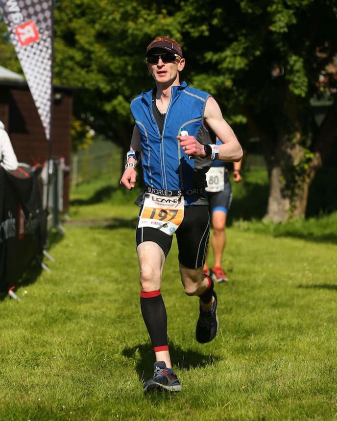 Matt Jolly is running a cross-country race