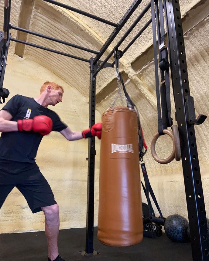 Matt Jolly practicing jabs on a punch bag